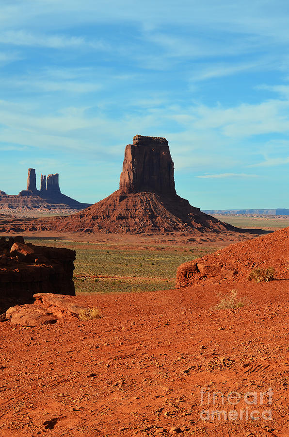 Monument Valley Utah Red Sanstone Butte Rising Up Above Desert Plain Photograph by Shawn OBrien