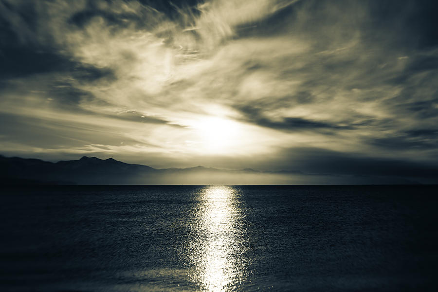 Moody Blue Sea Photograph by Michele Cornelius