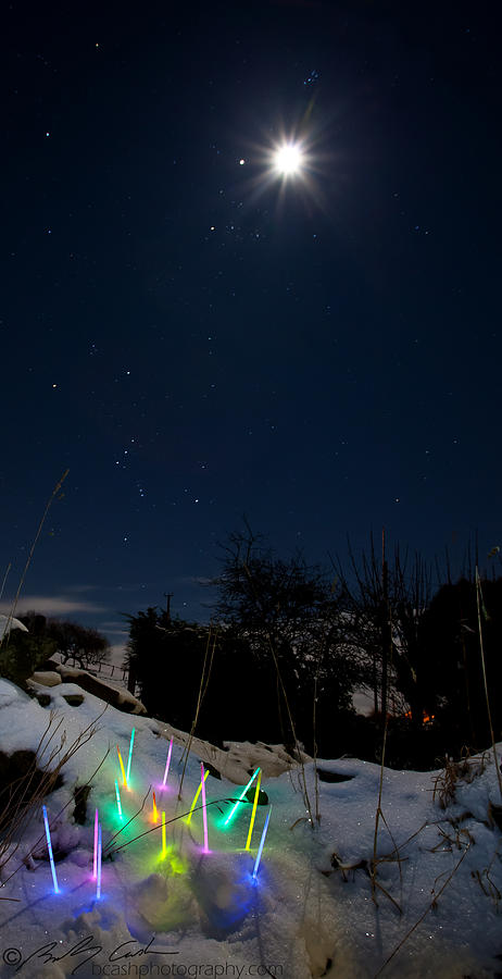 Moon Jupiter Orion snow and glowstix Photograph by B Cash