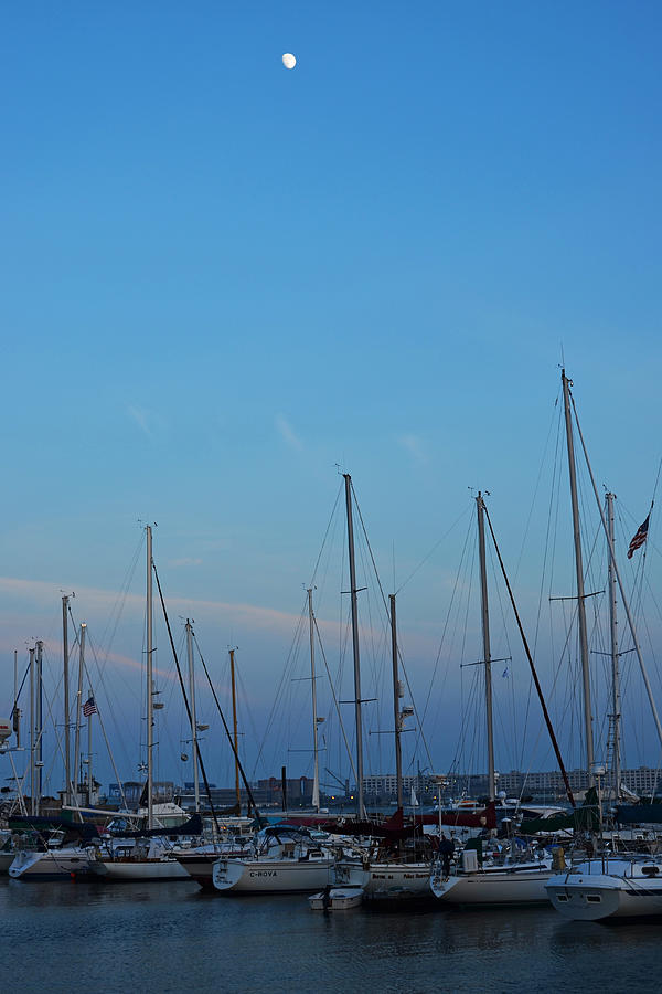 Moon over boats in East Boston Photograph by Toby McGuire