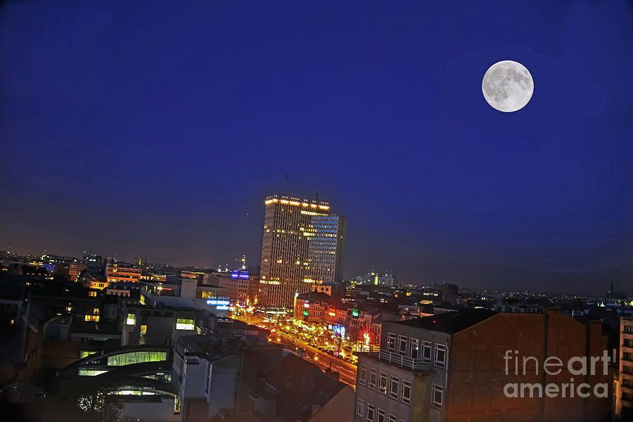 Moon Over Brussels Photograph by Elvis Vaughn