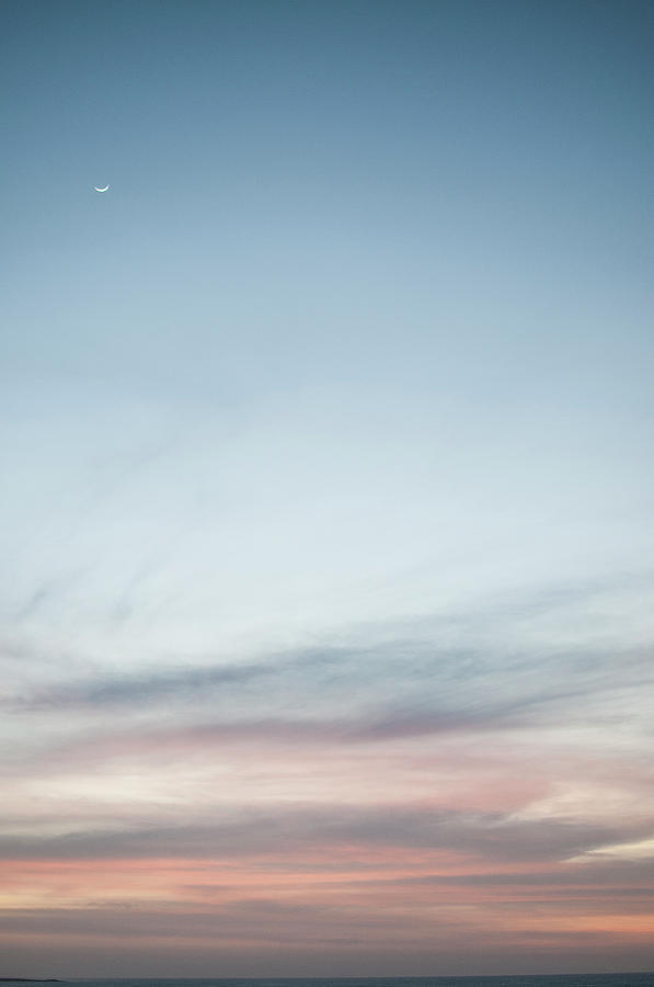 Moon Rising Over Colorful Sky Photograph by Matt Walford