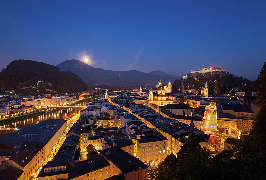 Moon Rising Over Salzburg Photograph by Jorg Greuel