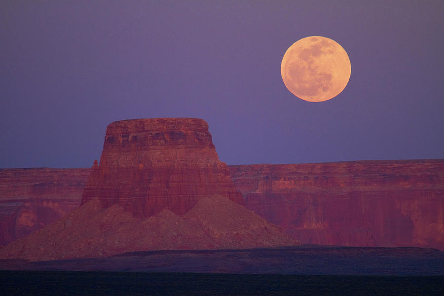 the moon comes over the tower