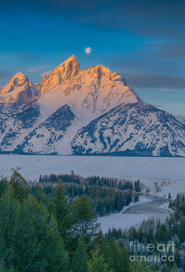 Moon Setting Behind the Tetons Photograph by Brad Schwarm