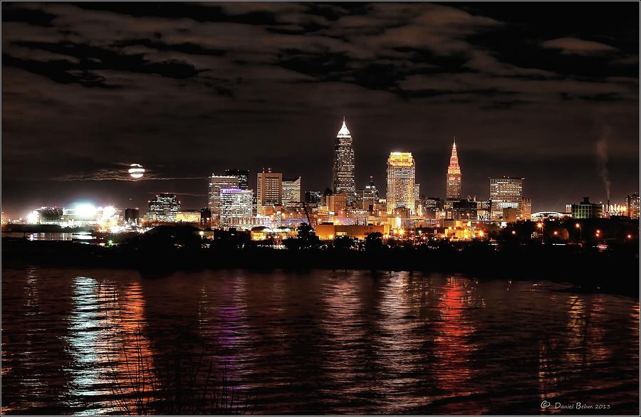 Cleveland Photograph - Moonrise over Cleveland Skyline by Daniel Behm