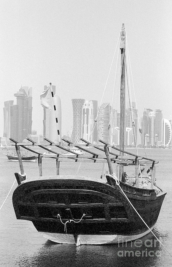 Moored dhow in Doha Photograph by Paul Cowan