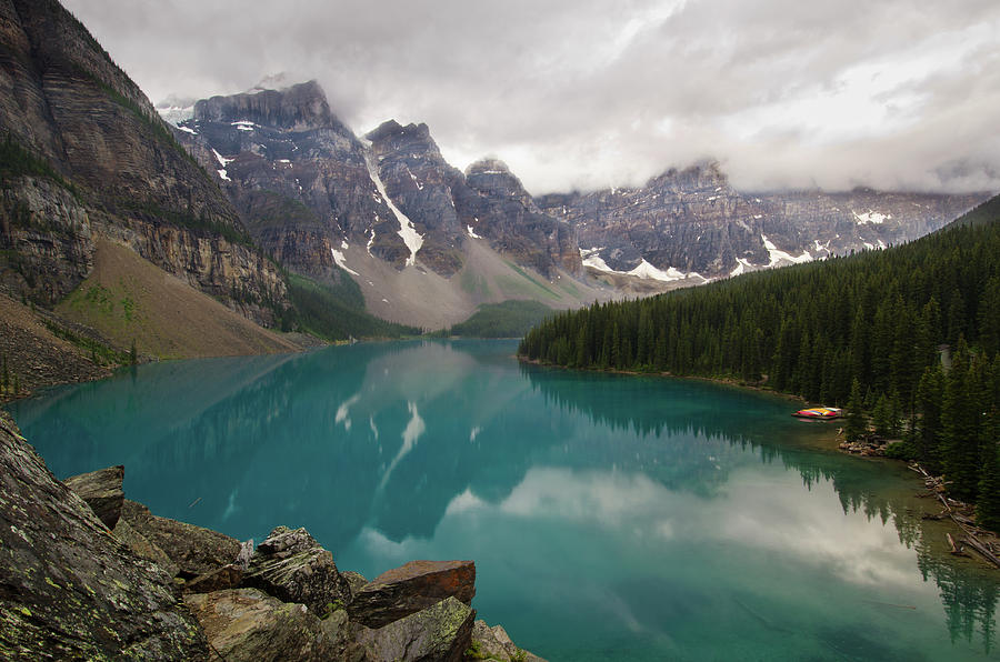 Moraine Lake With Cloudy Peaks In Photograph by Rebecca Schortinghuis