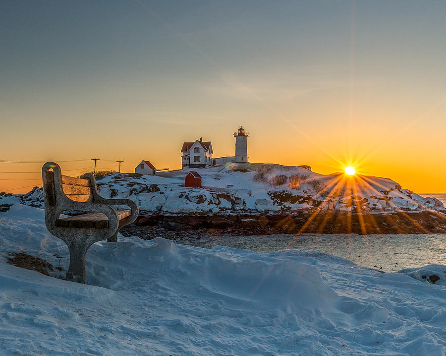 Morning light at Nubble Lighthouse Photograph by Bryan Xavier