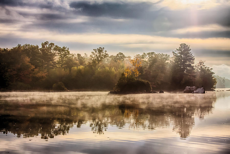 Morning mist rises Photograph by Jeff Folger