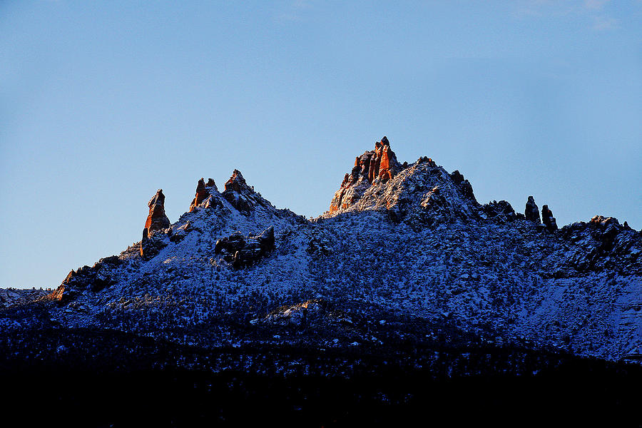 Sunrise Photograph - Morning on the Snaggle Tooth Mountians by John Langdon