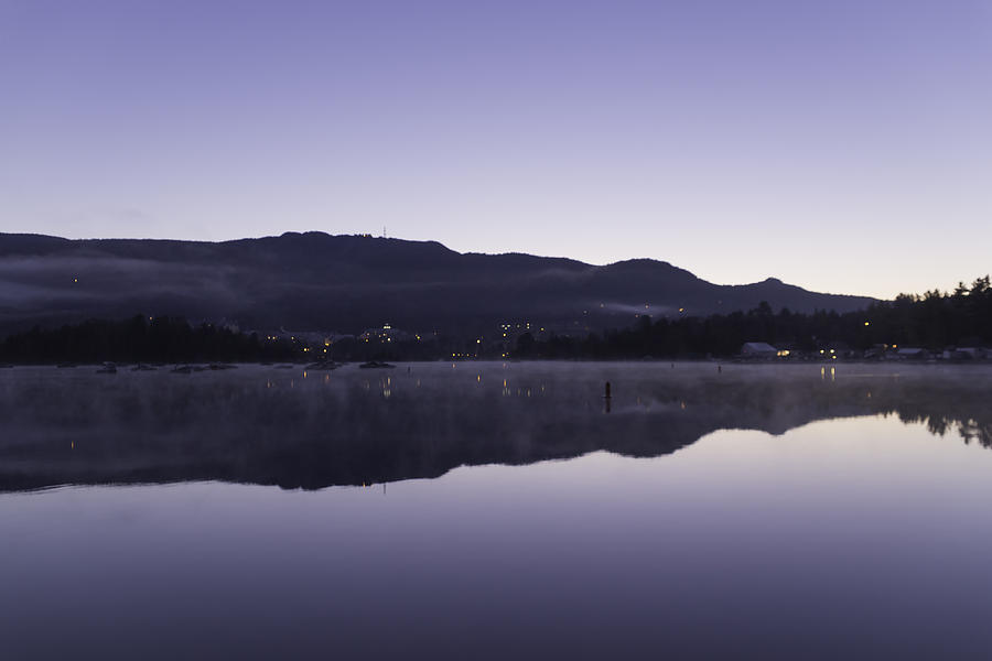 Morning over a lake of glass Photograph by Josef Pittner
