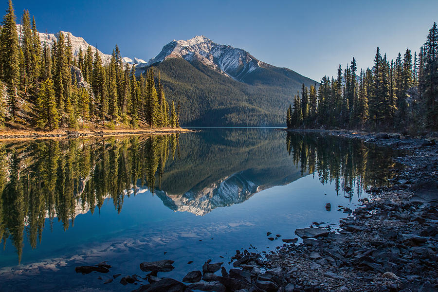 Morning reflection at Maligne lake Jasper Photograph by Pierre Leclerc Photography