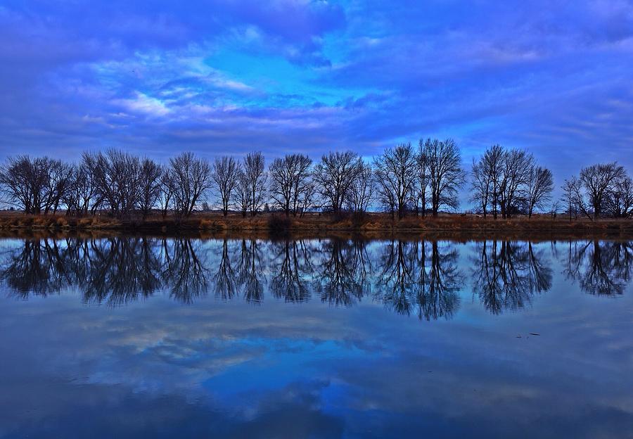 Blue morning reflection Photograph by Lynn Hopwood