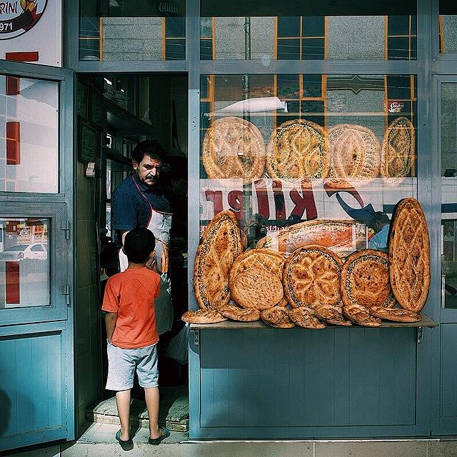 Bread Photograph - Morning Rituals. Picking Up Fresh by David  Hagerman