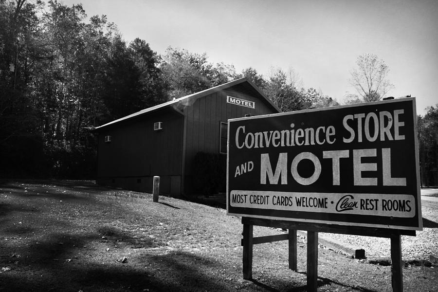 Motel Sign in Black and White Photograph by Kelly Hazel