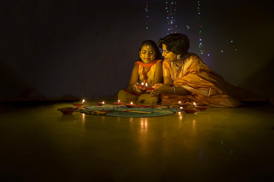 Mother and daughter with Diyas on Diwali Photograph by Soumen Nath Photography