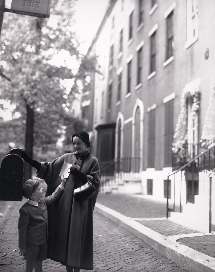 Mother And Son By A Mailbox Photograph by Horst P. Horst