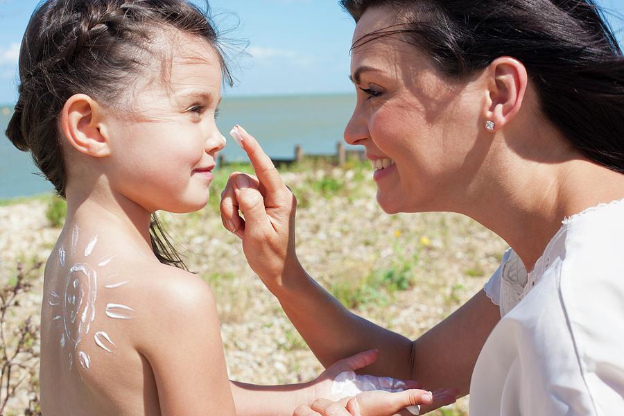 Mother Applying Suncream To Daughter Photograph by Science Photo Library Mother Applying Suncream To Daughter Photograph by Science Photo Library