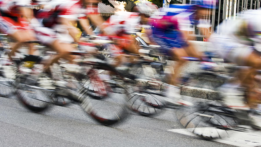 Motion Blur of Bicycle Race Riders. Color Image Photograph by Claudio.arnese