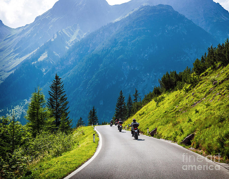Moto racers on mountainous road Photograph by Anna Om