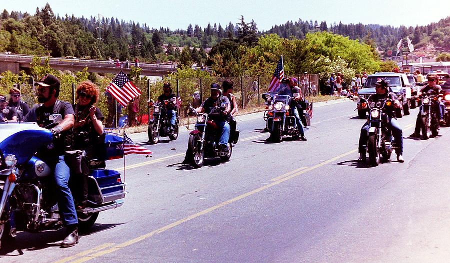 Motorcycle riders in parade Photograph by Karl Rose