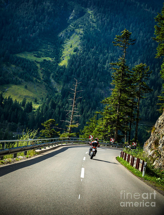 Motorcyclist on mountainous road Photograph by Anna Om