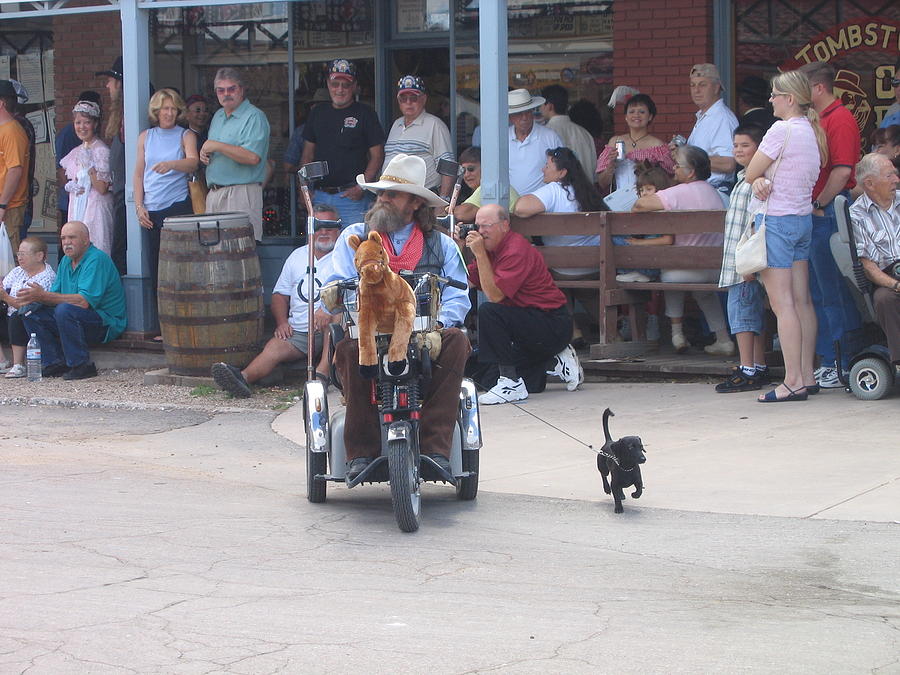 Motorized cowboy and his dog Allen Street Tombstone Arizona 2004 Photograph by David Lee Guss