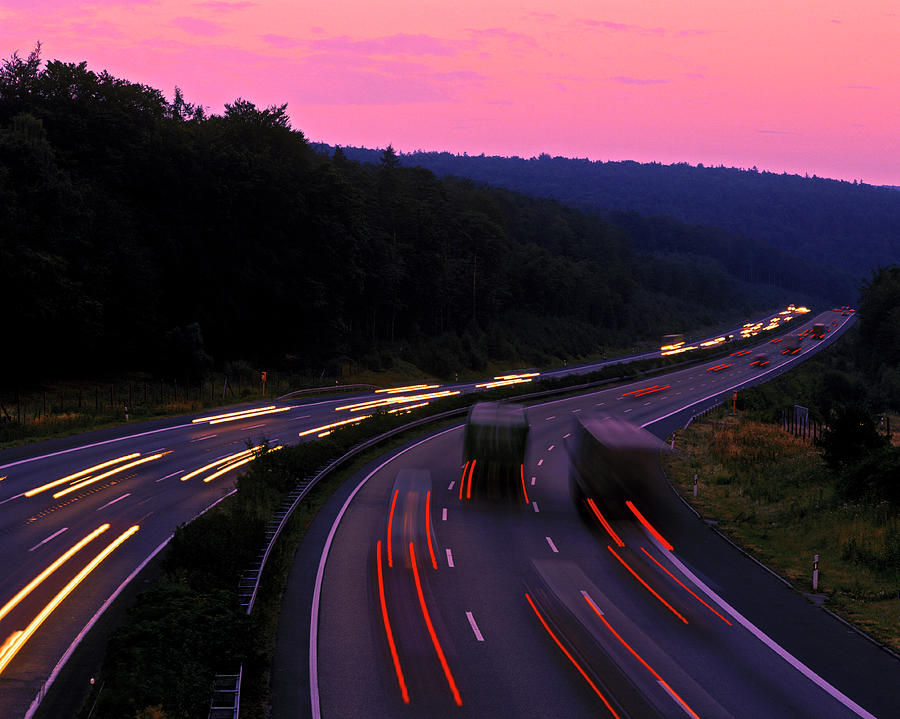 Motorway With Traffic At Dawn Photograph by Hans-peter Merten