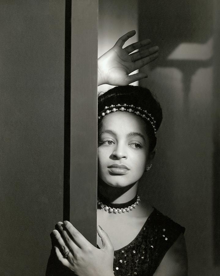 Moune Posing By A Wall Photograph by Horst P. Horst