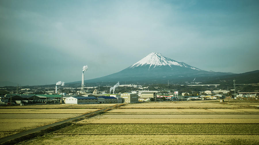 Mount Fuji In Winter, Behind Buildings Photograph by Matthias Lambrecht