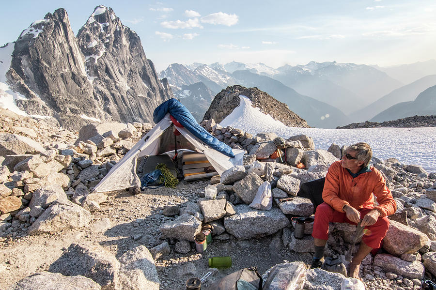 Mountain Climber Sitting Near Tent Photograph by Suzanne Stroeer