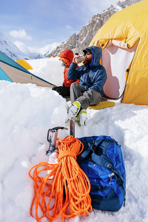 Mountain Climbers Resting At Base Camp Photograph by Andrew Peacock