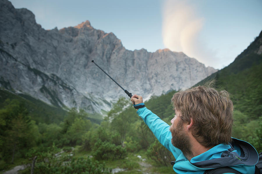 Pole Photograph - Mountain Guide Pointing At Route by Menno Boermans Pole Photograph - Mountain Guide Pointing At Route by Menno Boermans