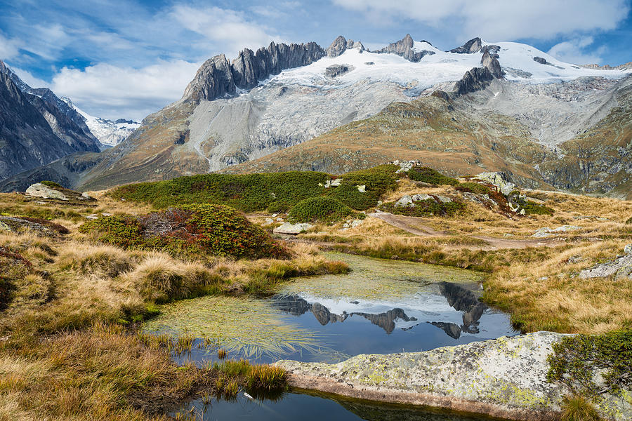 Mountain landscape water reflection Swiss Alps Photograph by Matthias Hauser