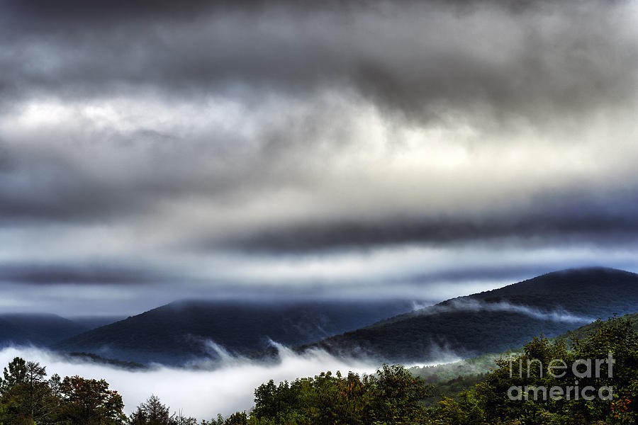 Mountain Mist And Heavy Cloud Cover Photograph