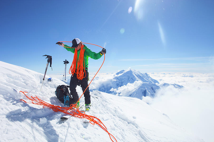 Mountain Ranger Tom Ditola Is Coiling Photograph by Menno Boermans ...