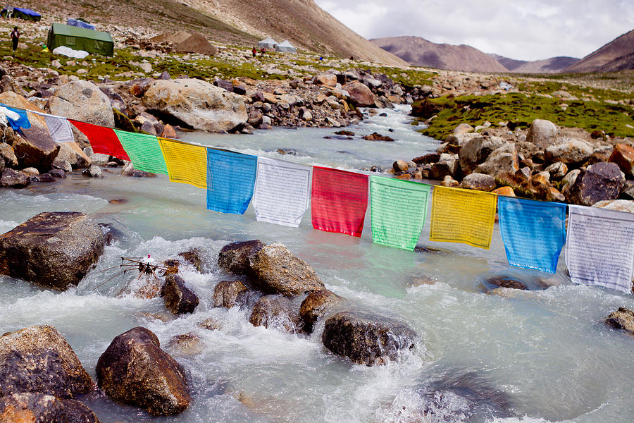 Mountain river and buddhist flags lungta  Photograph by Raimond Klavins