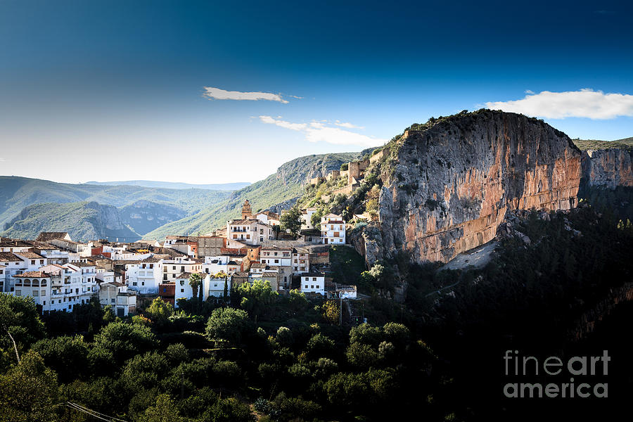 Mountain village of Chulilla nestling alongside a deep gorge in valencia spain Photograph by Peter Noyce