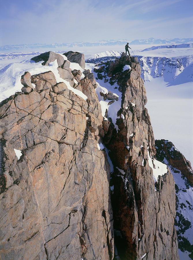 Mountaineer On The Summit Of A Greenland Peak Photograph by Simon Fraser/science Photo Library