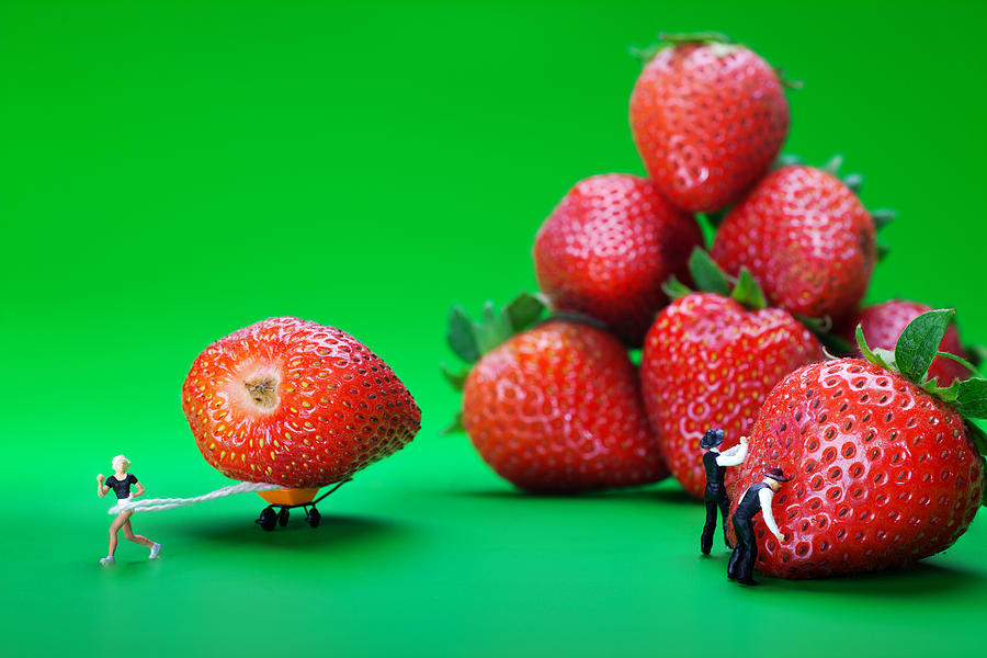 Moving strawberries to depict friction food physics Photograph by Paul Ge