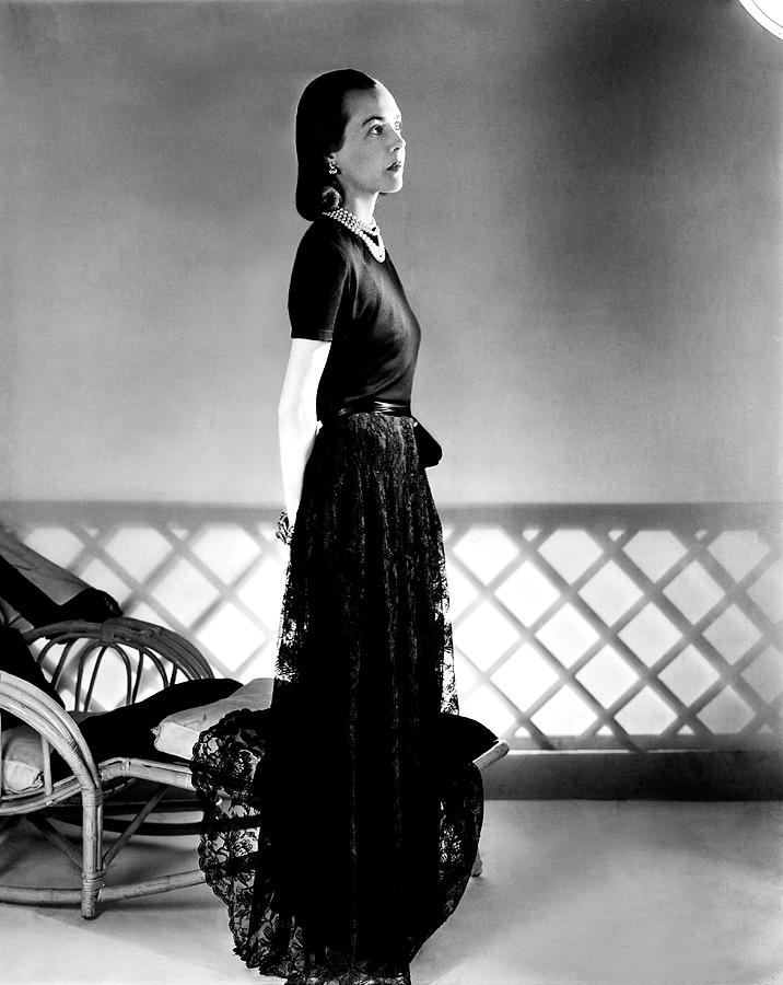 Mrs. Carroll Carstairs Wearing A Lace Skirt Photograph by Horst P. Horst