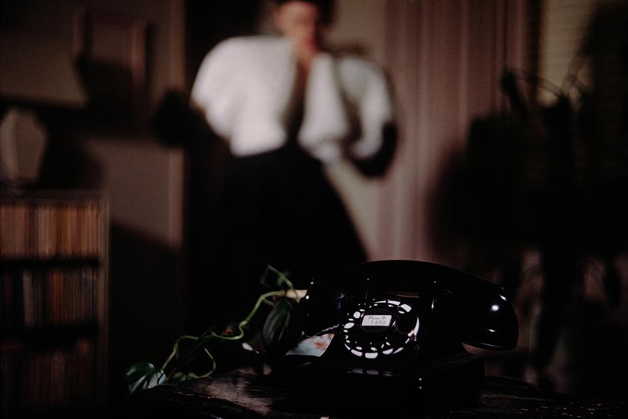 Mrs. Tyron Behind A Telephone Photograph by John Rawlings