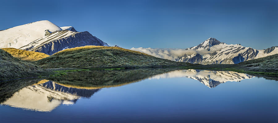 Mt Aspiring Reflected At Cascade Saddle Photograph by Colin Monteath