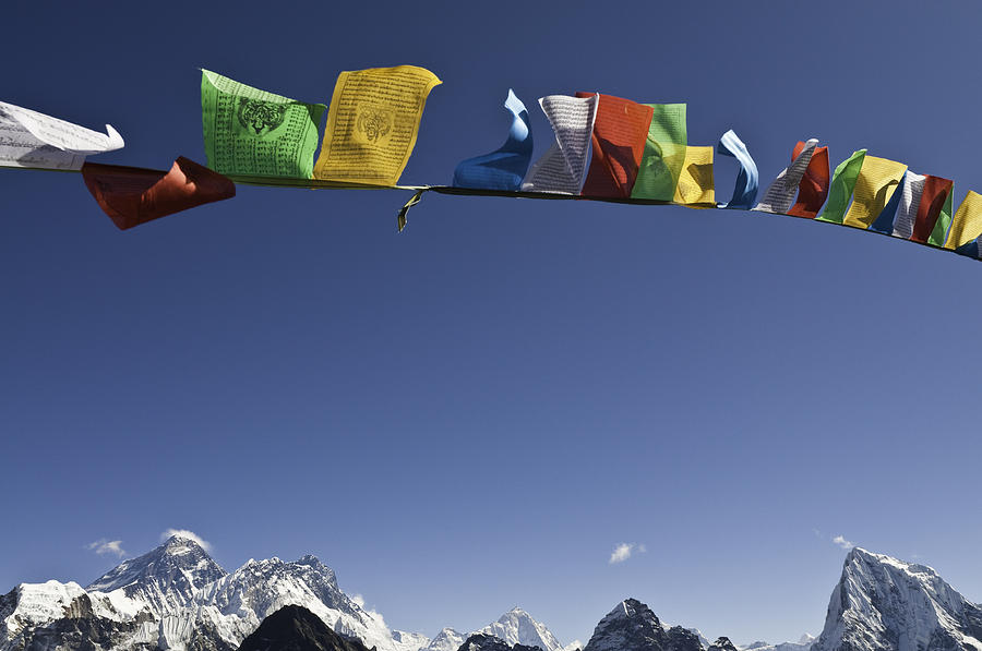 Mt Everest summit vibrant buddhist prayer flags flying blue sky Photograph by fotoVoyager