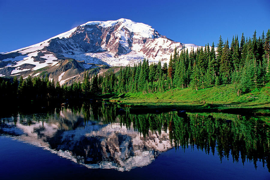Alpine Photograph - Mt. Rainier Reflects Perfectly In An by Cliff Leight