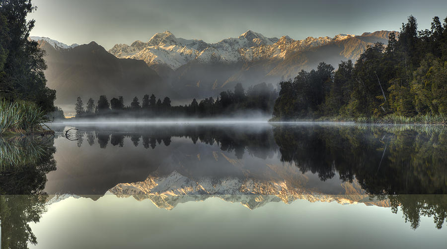 Mt Tasman And Mt Cook Reflected In Lake Photograph by Colin Monteath