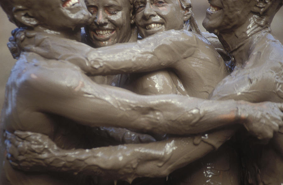 Cataract Canyon Photograph - Mud-covered People Hugging by Dawn Kish