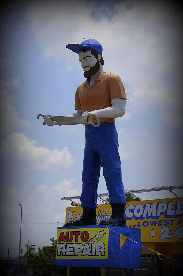 Car Photograph - Muffler Man by Laurie Perry