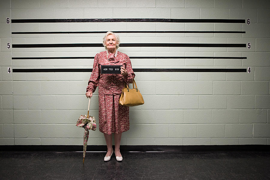 MUgshot of senior woman Photograph by Image Source MUgshot of senior woman Photograph by Image Source